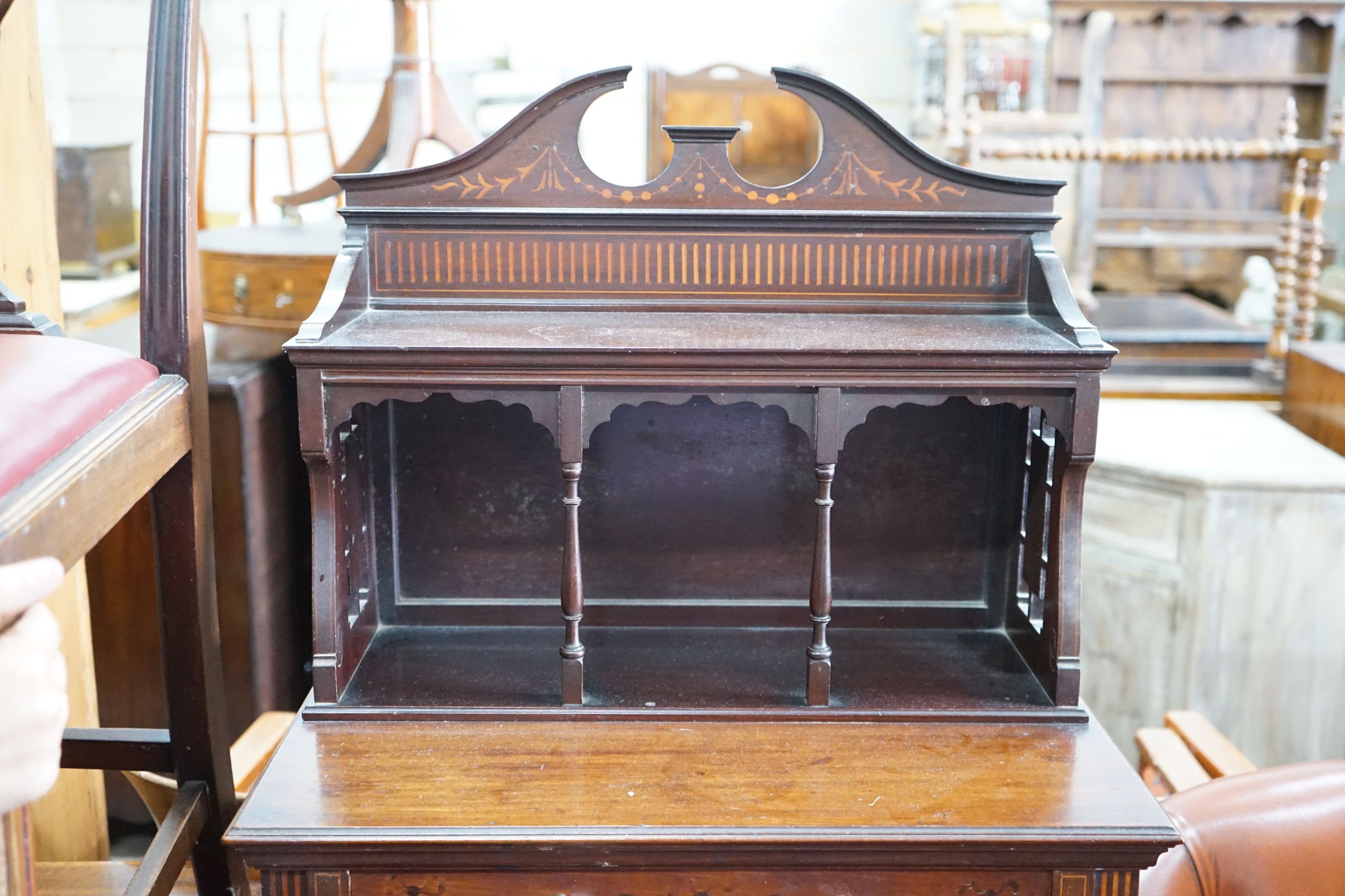 An Edwardian marquetry inlaid mahogany side cabinet, with galleried top, open shelves and a pair of cupboard doors, width 58cm, depth 35cm, height 145cm